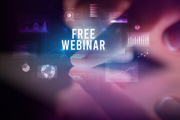 Finger touching tablet with business graphs and icons concept