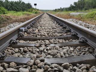 railroad tracks. The stones were placed between the bodies of the trains.