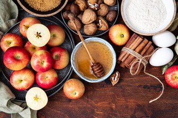 Baking concept of autumn apple pie.  View from above on kitchen table. 