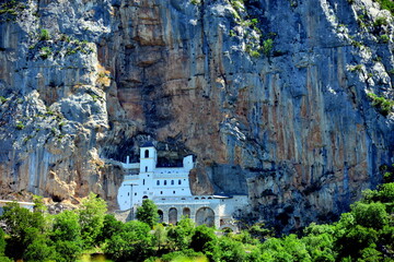 Fototapeta na wymiar Montenegro:Ostrog Monastery is a monastery of the Serbian Orthodox Church positioned against a vertical rock face on the Ostroška Greda cliff, dedicated to Saint Basil of Ostrog