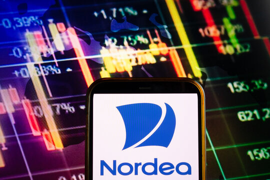 KONSKIE, POLAND - September 10, 2022: Smartphone displaying logo of Nordea Bank company on stock exchange chart background