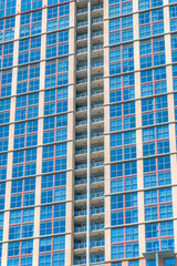 Glass windows and balconies at the facade of apartments in Austin Texas