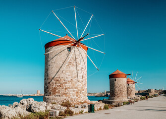 Fototapeta na wymiar Windmills in Rhodes city in Rhodes island in Greece