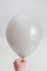gray latex balloon isolated on white background