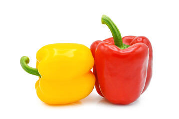Yellow and red bell peppers isolated on white background. 