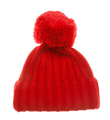Red knitted winter bobble hat of traditional design isolated on white background. Handmade woolly cap with pompom on top - obrazy, fototapety, plakaty