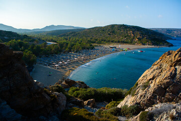 A beautiful landscape with a beach with white sand and crystal clear water from the island of Crete, Greece