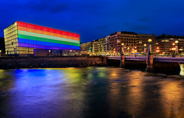 Obraz premium San Sebastian, Spain skyline with Kursaal with LGBT Pride rainbow flag at sunset
