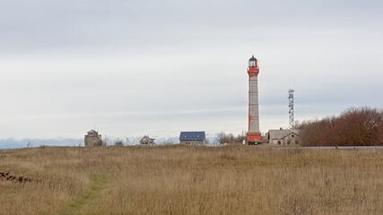 Fototapeta na wymiar Lighthouse on the Baltic sea coast of Pakri Peninsula, Paldiski, Estonia