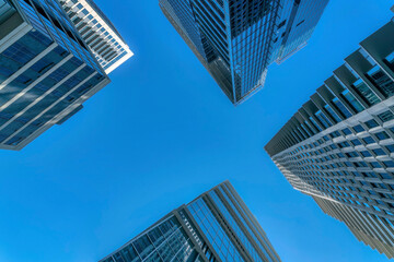 Fototapeta na wymiar Looking up at skyscrapers in Austin Texas skyline with blue sky background