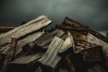 A lot of firewood for heating the house. The trees were cut down and split into firewood to be used...