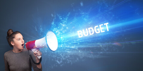 Young person shouting in loudspeaker