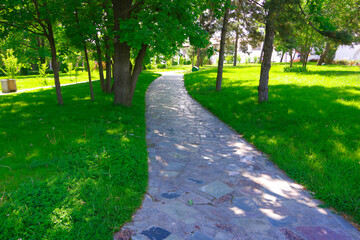Winding footpath in the city park in astrakhan.