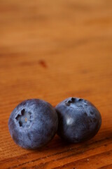 Background with berries - fresh bilberry; Vaccinium Myrtillus