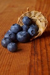 Background with berries - fresh bilberry; Vaccinium Myrtillus
