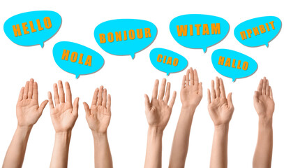 Many raised hands and speech bubbles with words HELLO in different languages on white background