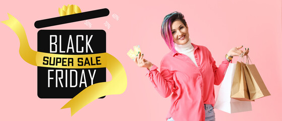 Beautiful woman with credit cards and shopping bags on pink background. Black Friday sale