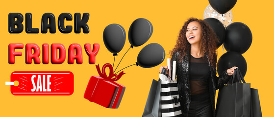 Beautiful African-American woman with shopping bags and balloons on yellow background. Black Friday...