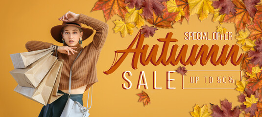 Beautiful young woman with shopping bags on beige background. Banner for autumn sale