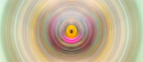 Abstract glowing background. Concentric circles of colored light.