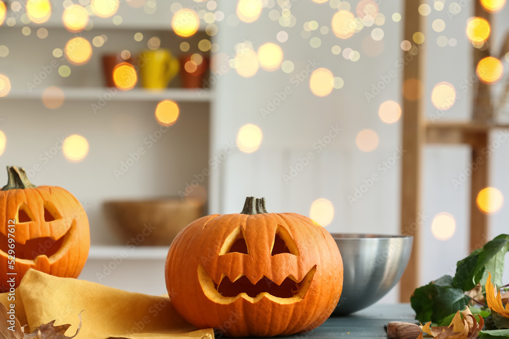 Wall mural carved halloween pumpkins on table