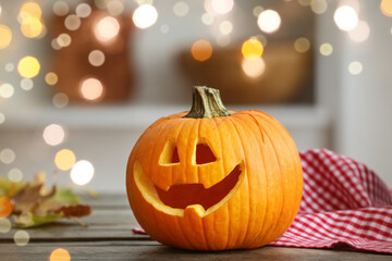 Obraz premium Carved Halloween pumpkin on table