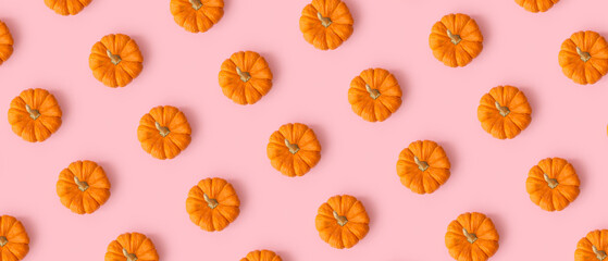 Many ripe pumpkins on pink background. Pattern for design - Powered by Adobe