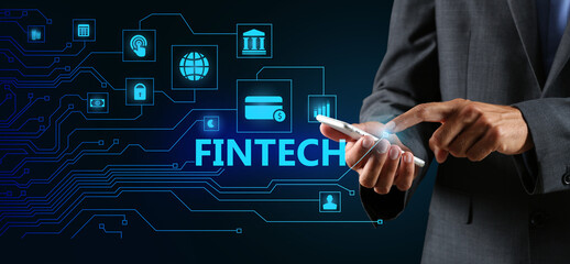 Businessman with mobile phone on black background. Concept of financial technology