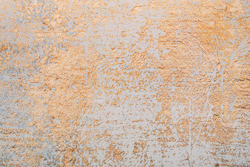 Light wall with golden pattern as background, closeup