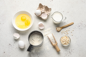 Composition with different ingredients for baking on light background