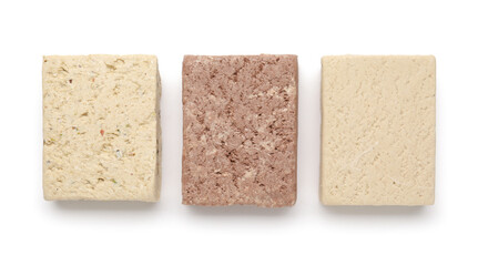 Pieces of tasty sesame halva on white background