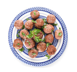 Plate with tasty meat balls and cut parsley on white background