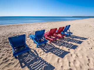 Chairs on Lake Michigan Beach in Village of Jacksonport in Door County Eisconsin USA