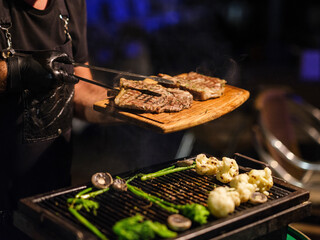 delicious steaks barbecued in the garden