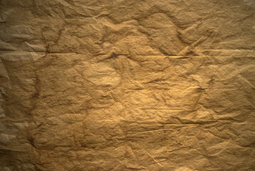 A photo of the texture of old yellowed paper. The blank paper of an old manuscript. The background is made of old paper.