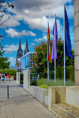 Cologne, Germany - July 9. 2022: View beyond Hyatt regency hotel building on rhine boulevard with...