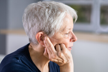 Fototapeta premium Hearing Aid And Painful Ear Ache