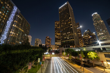 Los Angeles at night with car trails leading down the streets