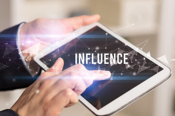 Close up hands using tablet