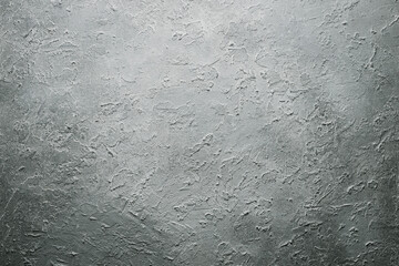 rough plastered gray wall with gradient background backdrop. High quality photo