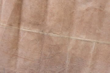 brown leather background with creases