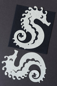 paper seahorses close up