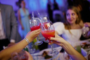 alcoholic cocktails and shots at a night party