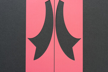 2d paper ribbon (stencil) with tails on dark gray paper