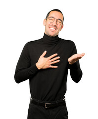Fototapeta premium Naughty young man laughing at you