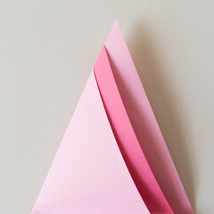 folded construction paper - pink and red triangle