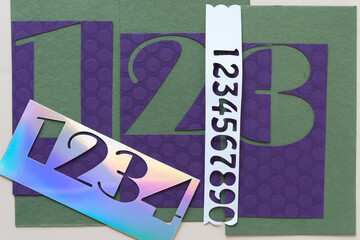 numbers background (in iridescent, purple, white, and green)