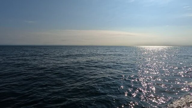 Slow Motion Boat Wake and Horizon Views on majestic Lake Superior. Located between Copper Harbor and Isle Royale in the Upper Peninsula of Michigan.