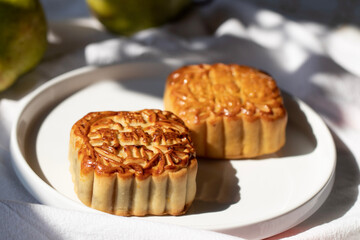 two mooncakes on a plate