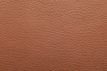 Obraz premium Texture of light brown leather as background, closeup